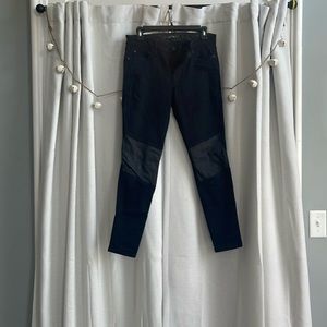 Black jeans with leather patches